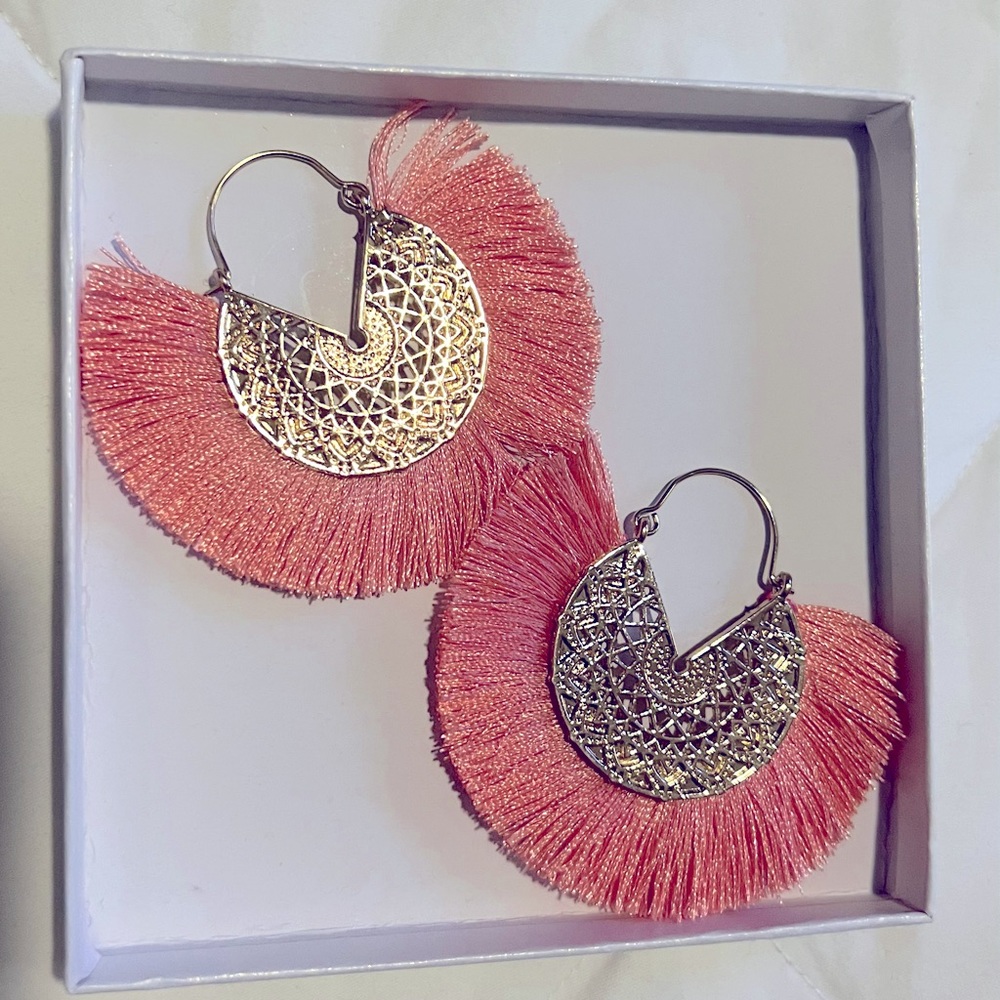 Fan earrings.